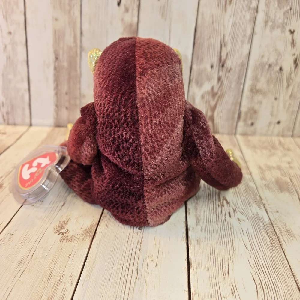 Plush Toy with Sparkly Gold Accents